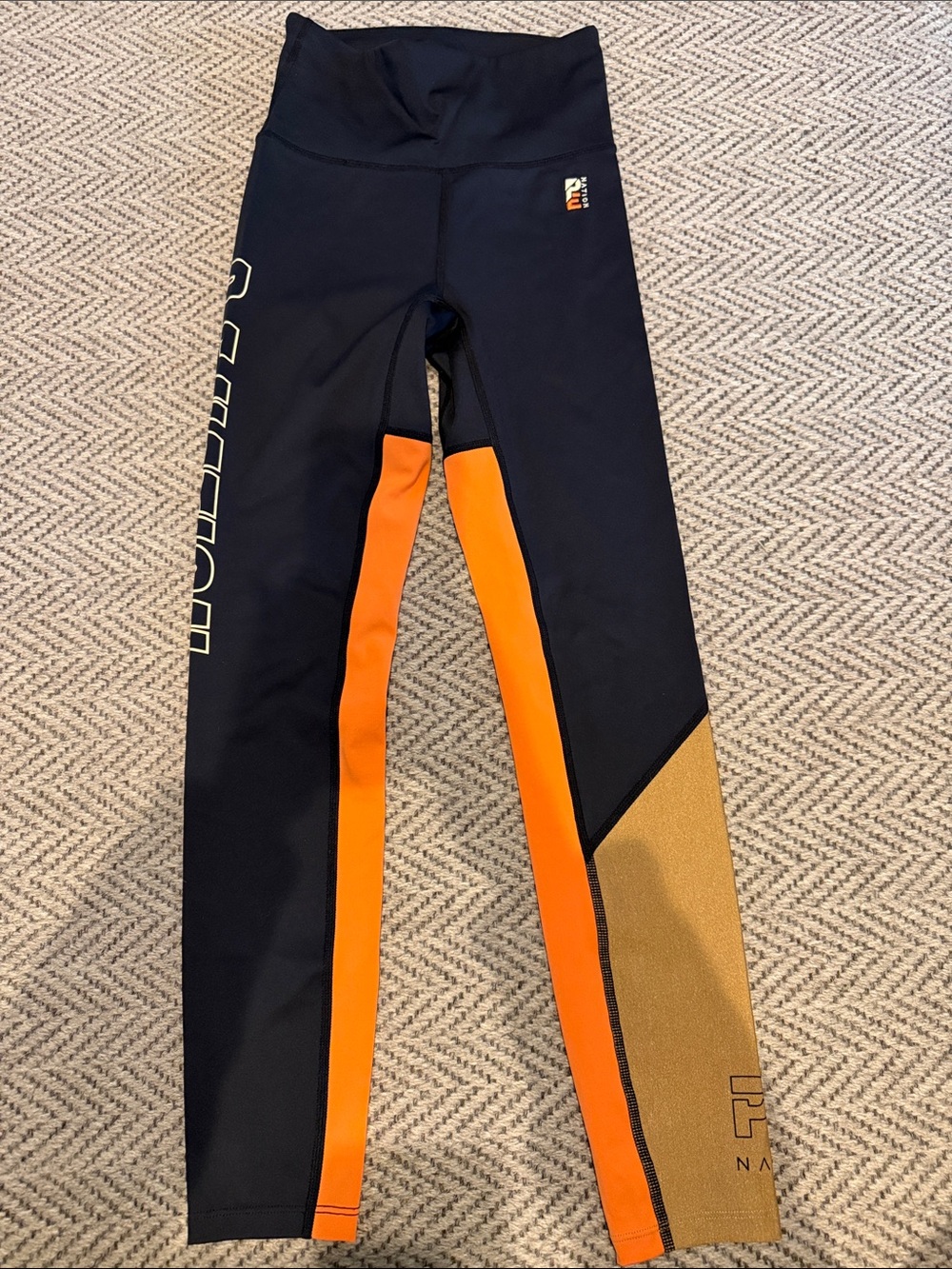 P.E Nation Black Leggings with Bright Orange & Gold Panels